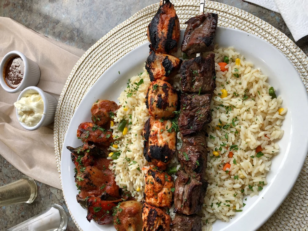 Homemade mixed grill with rice served at Golden Pita Lebanese restaurant in Ancaster